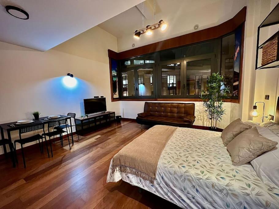 Central Suites Arenal فيجو المظهر الخارجي الصورة